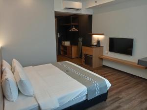 Voodi või voodid majutusasutuse 56 Hotel toas