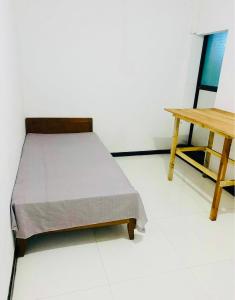 Postel nebo postele na pokoji v ubytování Che's Room