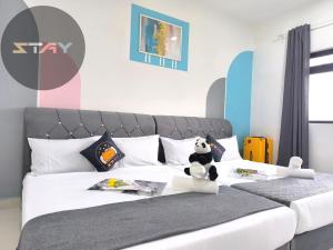 Postel nebo postele na pokoji v ubytování MM Family Vibrant Suites 3Mins To Legoland By STAY + 75 fotografií