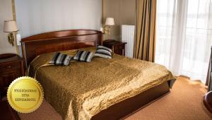 Postel nebo postele na pokoji v ubytování Duna Relax Hotel Ráckeve