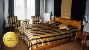 Postel nebo postele na pokoji v ubytování Duna Relax Hotel Ráckeve