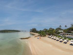 an aerial view of a beach with chairs and umbrellas at Anantara Lawana Koh Samui Resort in Chaweng