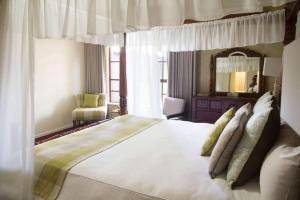 Mahogany Inn and Distillery客房内的一张或多张床位