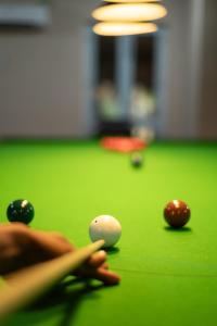 Biliár nebo kulečník v ubytování Club Palm Bay