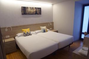 A bed or beds in a room at CASA SABINA