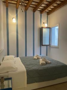 Ένα ή περισσότερα κρεβάτια σε δωμάτιο στο Marico'