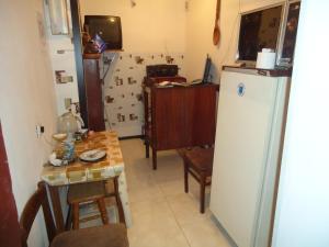 Kuchyň nebo kuchyňský kout v ubytování Guest House R&T