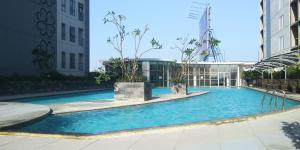 Bassein majutusasutuses Best Price and Homey 1BR at Tamansari Prospero Sidoarjo Apartment By Travelio või selle lähedal