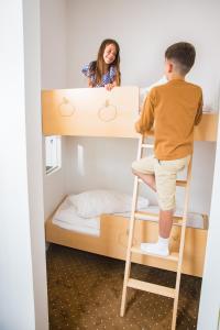 Ein Bett oder Betten in einem Zimmer der Unterkunft Pension Sonnengarten & Therme included - auch am An- & Abreisetag!