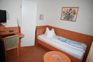 Postel nebo postele na pokoji v ubytování Hotel Passat