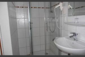 Koupelna v ubytování Hotel Passat