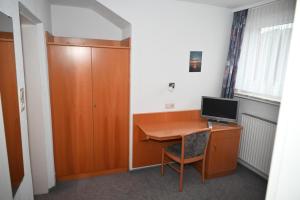 TV a/nebo společenská místnost v ubytování Hotel Passat