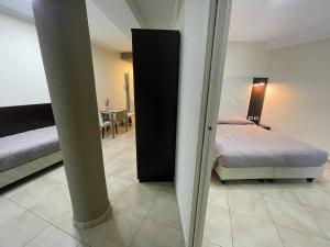 Hotel-Residence-b&b Le Dune beach service included客房内的一张或多张床位