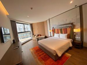 Katil atau katil-katil dalam bilik di Condotel Ocean View- Apec Mandala Mui Ne +56 gambar