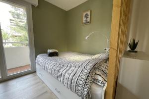 Posteľ alebo postele v izbe v ubytovaní Studio Cosy - Balcon - Wifi - Free parking