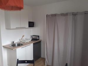 Køkken eller tekøkken på Studio 16m2 equipé