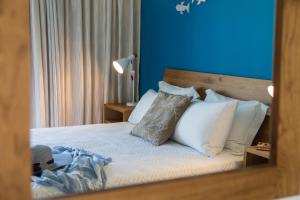 Posteľ alebo postele v izbe v ubytovaní Anemi Blue apt, suitable up to 4, near the beach!