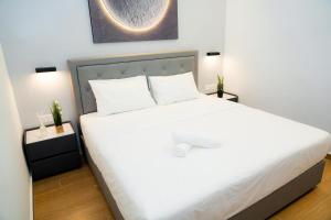 Postel nebo postele na pokoji v ubytování Moon Hotel