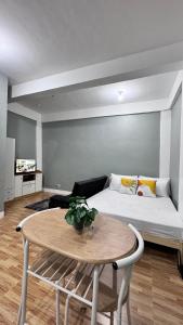Postel nebo postele na pokoji v ubytování Bangketa Apartments