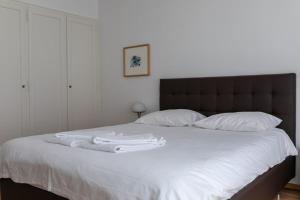 Postel nebo postele na pokoji v ubytování Charming 1BR apartment in the old town - UZ4