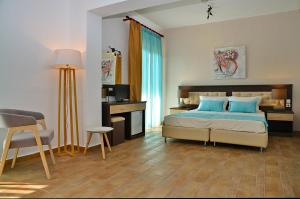 Postel nebo postele na pokoji v ubytování Belvedere Village + 17 fotografií