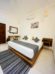 Ein Bett oder Betten in einem Zimmer der Unterkunft Manju`s place