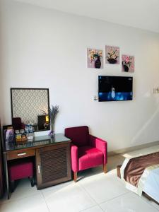 TV a/nebo společenská místnost v ubytování Ngoc Linh Luxury Hotel