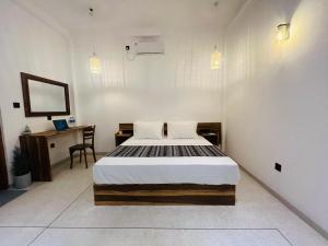Ein Bett oder Betten in einem Zimmer der Unterkunft Manju`s place