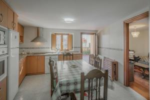 Kuchyň nebo kuchyňský kout v ubytování La Cabaña + 20 fotografií