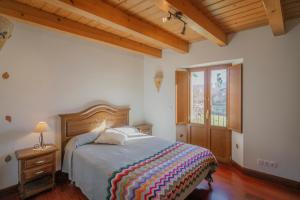 Postel nebo postele na pokoji v ubytování La Cabaña