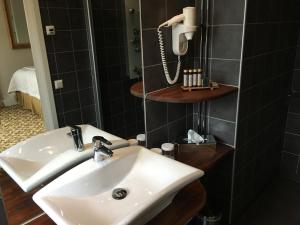 Koupelna v ubytování Sockerslottet Hotell