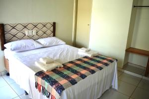 Canoas Hotel客房内的一张或多张床位
