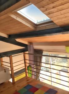 Katil atau katil-katil dalam bilik di Maison avec sauna à Saint-Sauveur-en-Rue, 60 m²