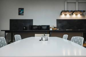 Kuchyň nebo kuchyňský kout v ubytování Rikap Coliving Spaces