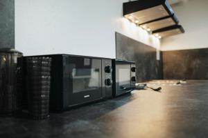 Kuchyň nebo kuchyňský kout v ubytování Rikap Coliving Spaces