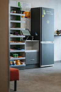 Kuchyň nebo kuchyňský kout v ubytování Rikap Coliving Spaces