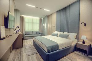 Postel nebo postele na pokoji v ubytování Hotel Dirista