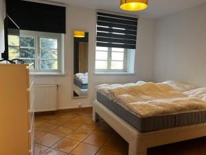 Ένα ή περισσότερα κρεβάτια σε δωμάτιο στο 2 rooms in Bardowick near Lüneburg