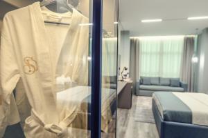 Postel nebo postele na pokoji v ubytování Hotel Dirista