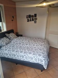 Postel nebo postele na pokoji v ubytování vakantiehuis en appartement De Harscamp