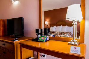 TV a/nebo společenská místnost v ubytování La Copa Hotel
