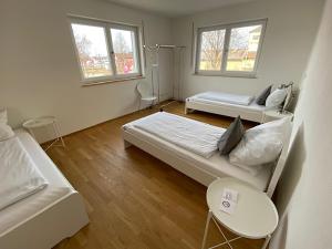 Ένα ή περισσότερα κρεβάτια σε δωμάτιο στο Isar Residences Landau