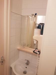 Koupelna v ubytování vakantiehuis en appartement De Harscamp