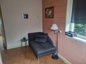 Posezení v ubytování vakantiehuis en appartement De Harscamp