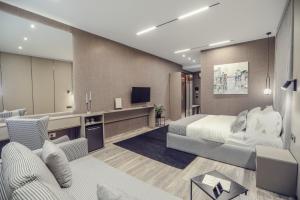 TV a/nebo společenská místnost v ubytování Hotel Dirista