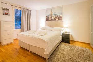 Cama o camas de una habitación en Los Lorentes Residences Bulle