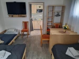 Postel nebo postele na pokoji v ubytování Apartmán u Bouře