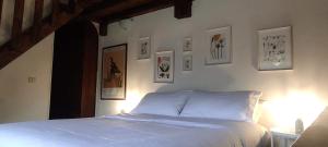 Letto o letti in una camera di La Casetta degli Innamorati