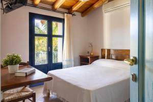 En eller flere senge i et værelse på Residenza Melissa + 31 billeder