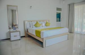 Ένα ή περισσότερα κρεβάτια σε δωμάτιο στο Lindy Stays Talpe